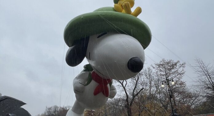 Macy's Thanksgiving Day Parade marches on, despite a steady downpour