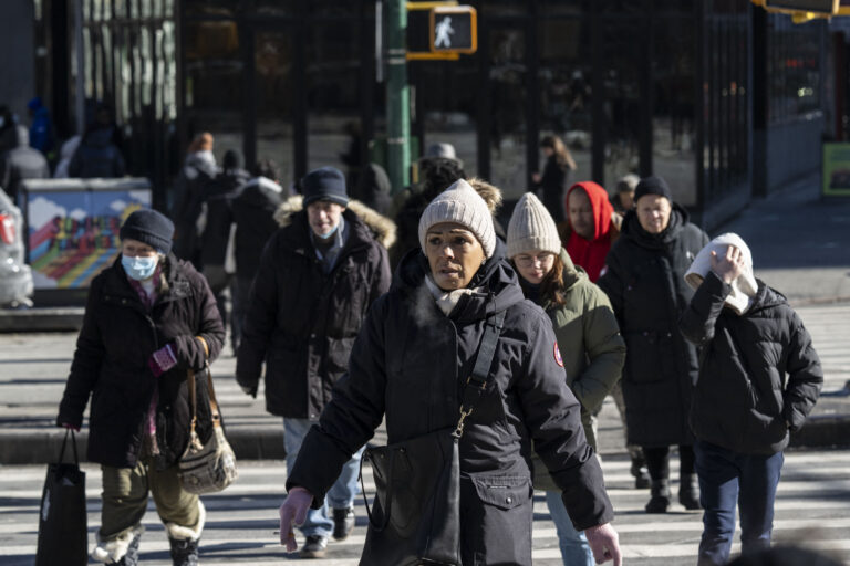 People walk in freezing cold temperatures in New York City on Jan. 17, 2024.